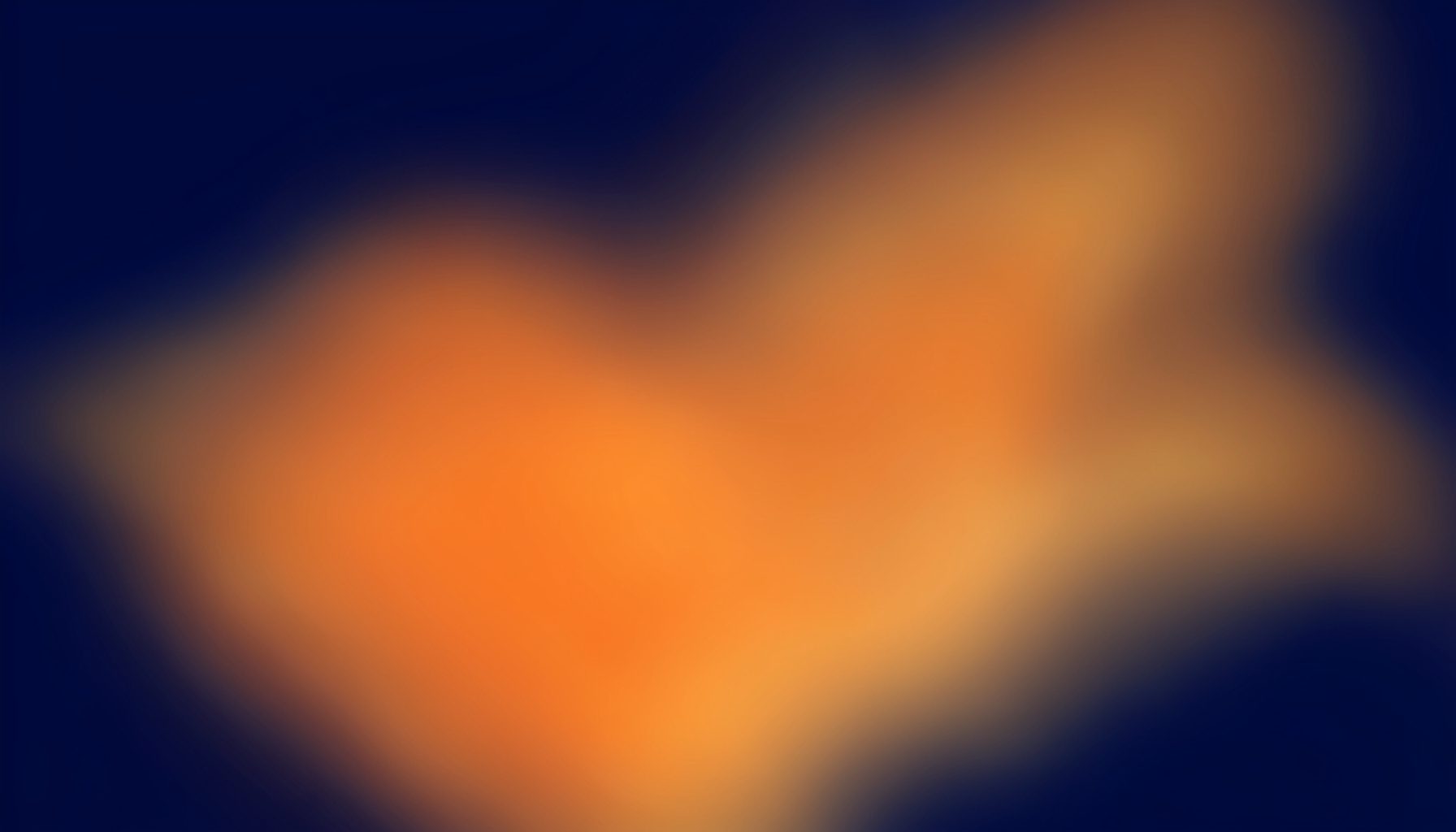 Deep navy and warm amber abstract gradient with soft blurred transitions, no figures or objects