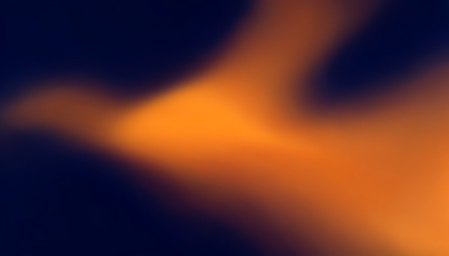 Abstract gradient composition in deep navy and warm amber tones, no figures or objects