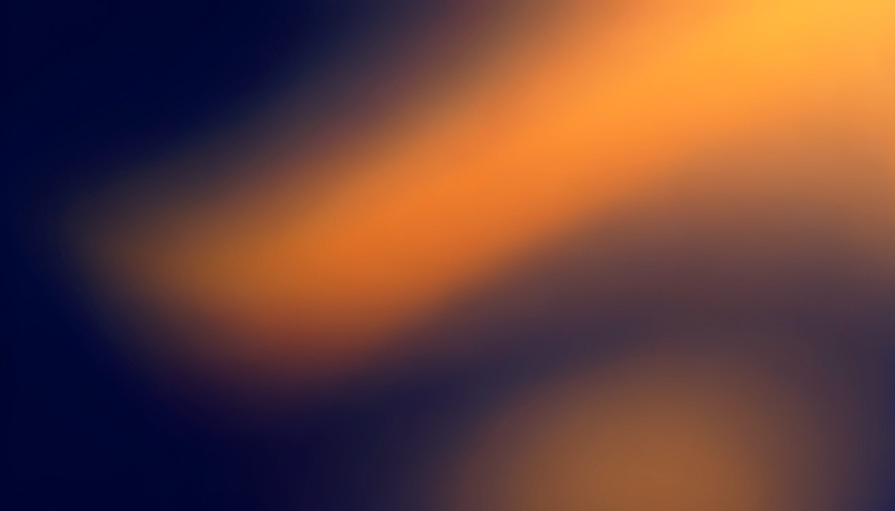 Deep navy gradient fading into warm amber tones, abstract atmospheric composition with no figures